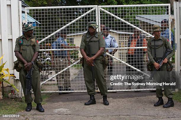 Fiji Unrest. Soldiers, including Meli Bainimarama, right, the son of Fiji's military chief Frank Bainimarama, surround the residence of the Fijian...