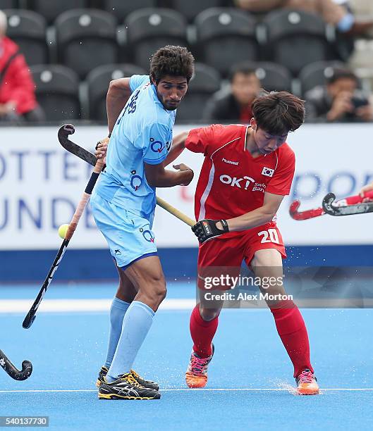 Pardeep Mor of India and Woohyeong Seo of South Korea during the FIH Mens Hero Hockey Champions Trophy match between India and South Korea at Queen...