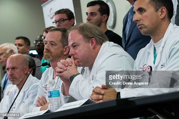 Dr. Marc Levy, Dr. Michael Cheatham, Dr. Will Havron and Dr. Joseph Ibrahim listen to questions during a press conference at Orlando Regional Medical...