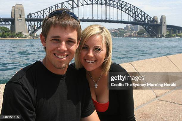 Australian golfer Aaron Baddeley and his wife Richelle pose in front of the Sydney Harbour Bridge, 12 November 2006. SMH Picture by TIM CLAYTON