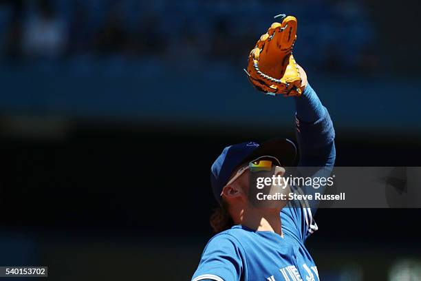 Toronto Blue Jays third baseman Josh Donaldson looks skyward as the Toronto Blue Jays play an afternoon game against the Philadelphia Phillies in...