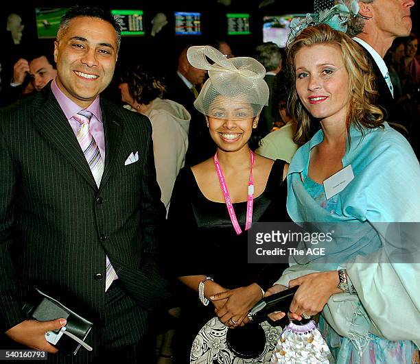 Spring Racing Carnival 2006. Age journalist Nabila Ahmed, centre, with Ahmed Fahour and his wife Dionnie at the 2006 Melbourne Cup at Flemington...