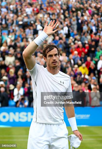 Andy Murray of Great Britain celebrates after victory in his first round match against Nicolas Mahut of France during day two of the Aegon...