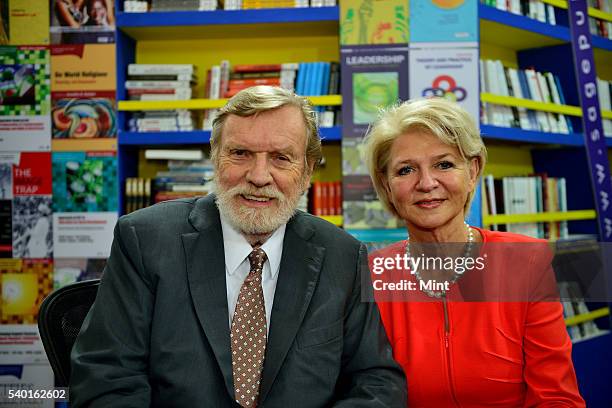 January 13: American author and public speaker Prof John Naisbitt with wife Doris Naisbitt poses at World Book Fair, Pragati Maidan during an...