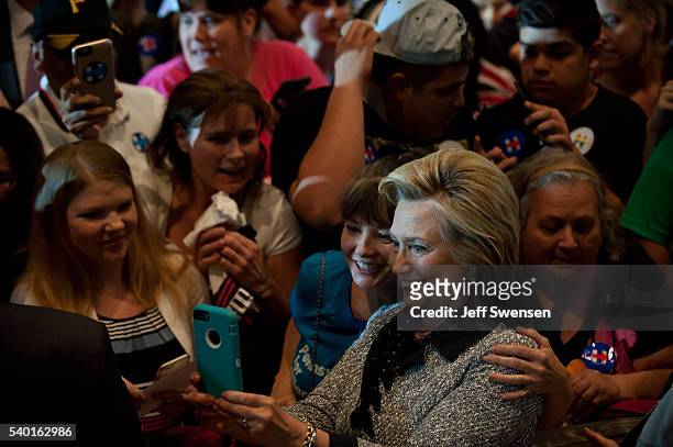 Presumptive Democratic nominee for president Hillary Clinton greets supporters at the International Brotherhood of Electric Workers Hall on Tuesday,...