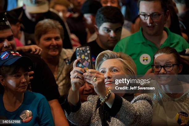 Presumptive Democratic nominee for president Hillary Clinton greets supporters at the International Brotherhood of Electric Workers Hall on Tuesday,...