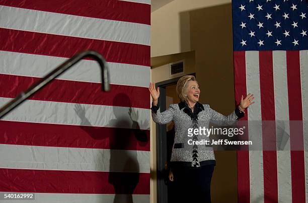 Presumptive Democratic nominee for president Hillary Clinton speaks to supporters at the International Brotherhood of Electric Workers Hall on...