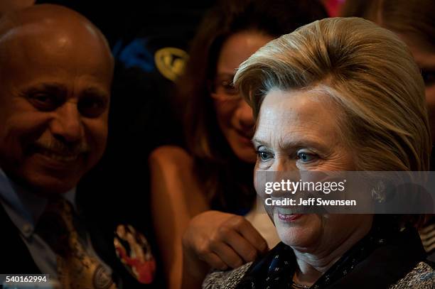 Presumptive Democratic nominee for president Hillary Clinton greets supporters at the International Brotherhood of Electric Workers Hall on Tuesday,...