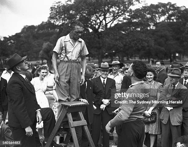 Speakers' Corner. A speaker lectures a bemused audience in the Domain, Sydney, 12 January 1947. SMH Picture by F. BURKE