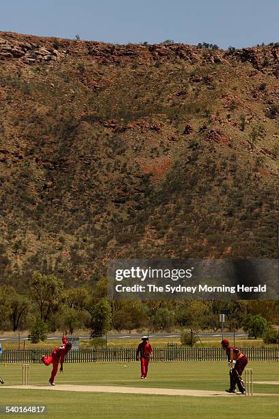 Indigenous teams from South Australia Play Queensland beneath the MacDonnell Ranges in Alice Springs for the Imparja Cup, 15 February 2007. SMH...