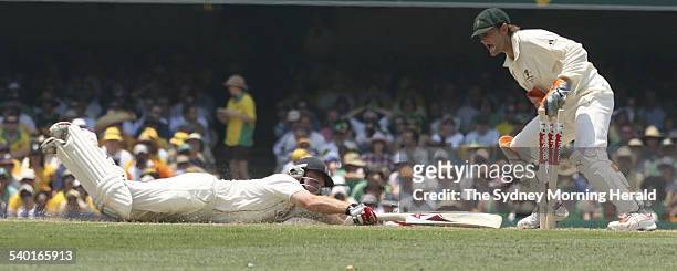 The Ashes 2006-2007. English batsman Ian Bell just crosses the line in time before Australian wicketkeeper Adam Gilchrist whips off the bails during...