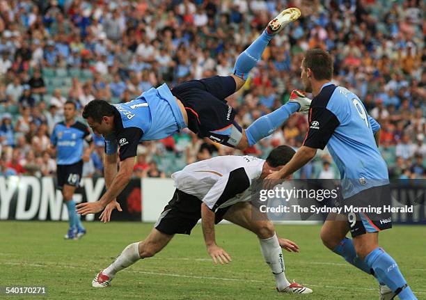 Sydney F.C. Versus New Zealand. Sydney's Sasho Petrovski goes over the top of Che Bunce while challenging for the ball, 7 January 2007. SMH SPORT...