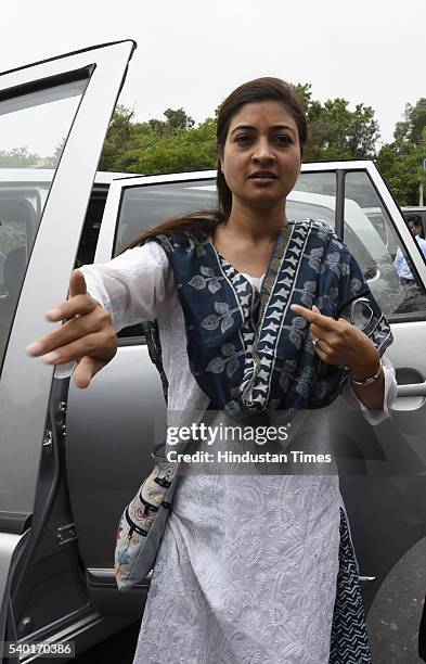 Alka Lamba arrives to support Transport Minister Gopal Rai on the issue of app-based premium bus scheme on June 14, 2016 in New Delhi, India. Delhi...