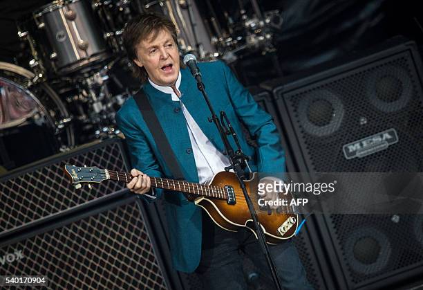 Ex-Beatle Paul McCartney performs on stage during his "One on one" tour at the Waldbuehne in Berlin on June 14 / AFP / dpa / Sophia Kembowski /...