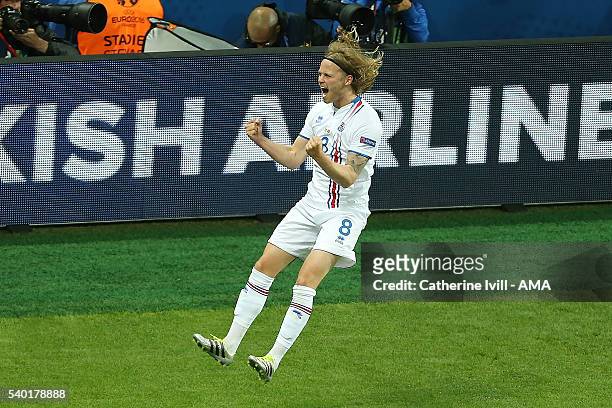 Bjirkir Bjarnason of Iceland celebrates scoring a goal to make the score 1-1 during the UEFA EURO 2016 Group F match between Portugal and Iceland at...