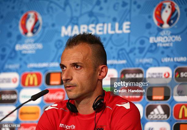 In this handout image provided by UEFA, Ansi Agolli faces the media during the Albania Press Conference at Stade Velodrome on June 14, 2016 in...