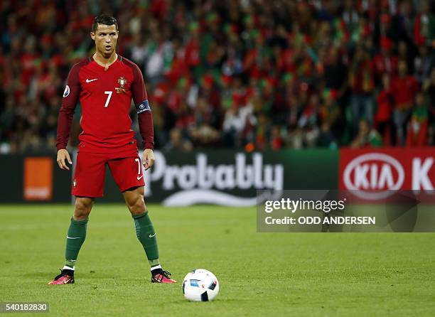 Portugal's forward Cristiano Ronaldo prepares for a free kick during the Euro 2016 group F football match between Portugal and Iceland at the...