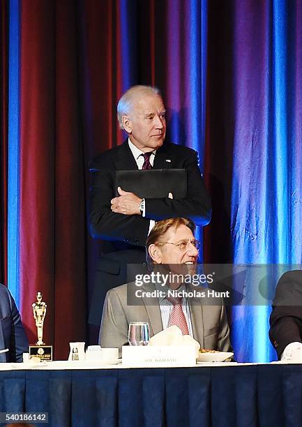 Event honorees Vice President of the United States Joe Biden and Joe Namth seen on stage during the 75th Annual Father Of The Year Awards Luncheon at...