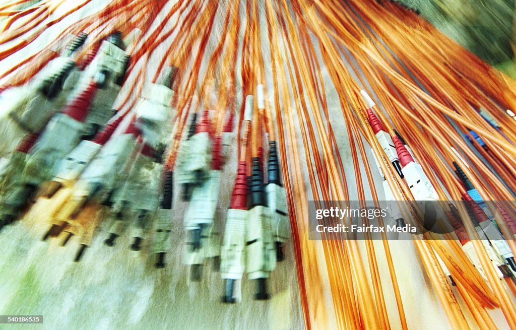 Generic Computer cables hang from the wall, 2 June 2003. AFR Picture by ERIN JO