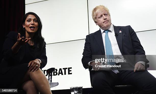 In this handout photo issued by the Daily Telegraph, Priti Patel and Boris Johnson take part in a Huffington Post/Daily Telegraph EU debate on June...