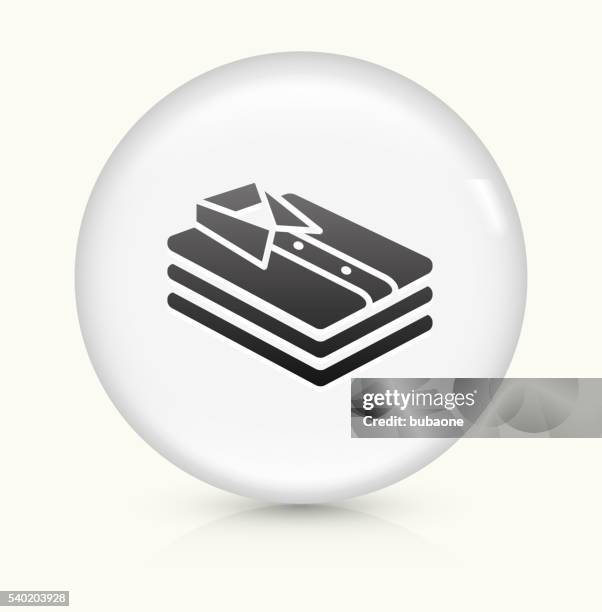 folded clothes icon on white round vector button - folded laundry stock illustrations