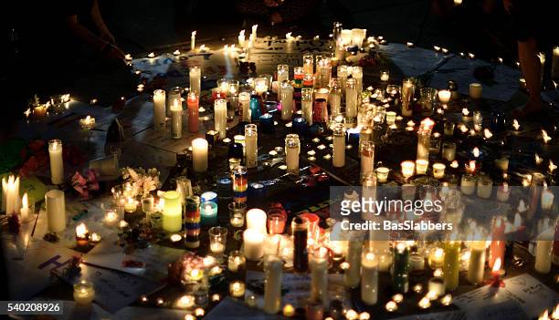 orlando massacre vigil in philadelphia, pennsylvania - memorial event stock pictures, royalty-free photos & images
