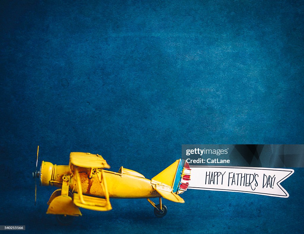 Happy Father's Day! Vintage airplane with handmade banner