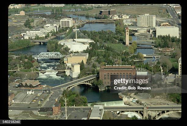 An aerial view of Spokane, which includes the Washington Water Power Building, the Monroe Street Bridge, and the site of the 1974 World's Fair along...