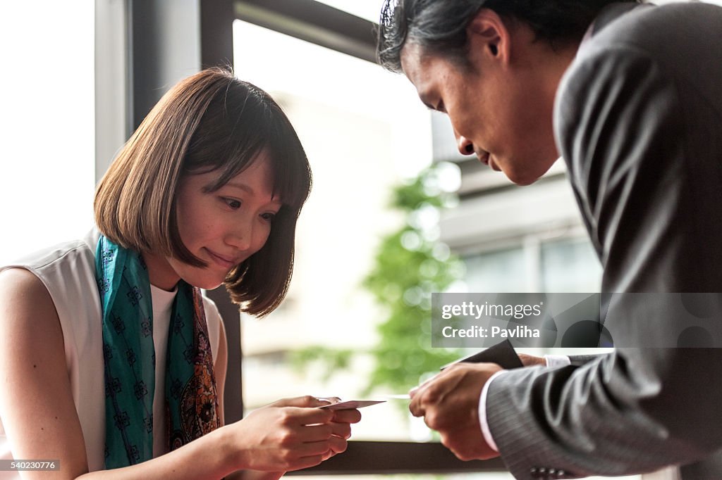 Business women exchanged business cards,Kyoto,Japan