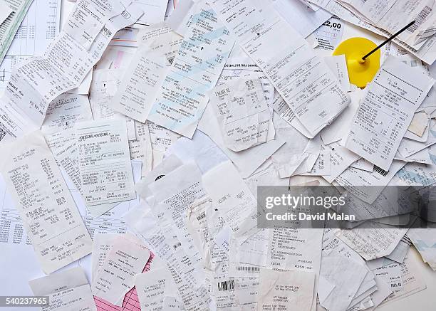 till slips on a surface - receipt stock pictures, royalty-free photos & images