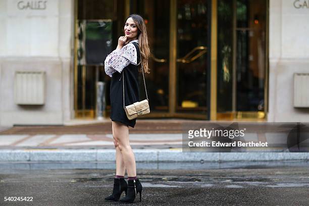Sofya Benzakour , is wearing a Sister Jane dress, a Dior bag, Primark shoes, and Asos socks, on June 14, 2016 in Paris.