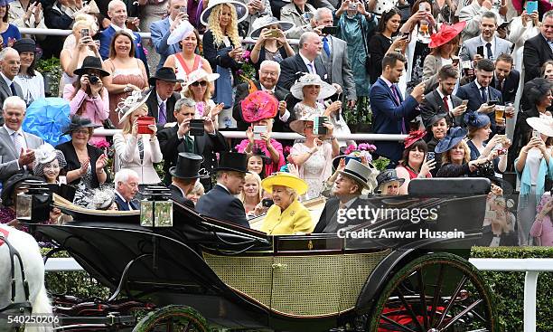 Queen Elizabeth ll, Prince Philip, Duke of Edinburgh and Prince Andrew, Duke of York arrive in an open carriage to attend Day 1 of Royal Ascot on...