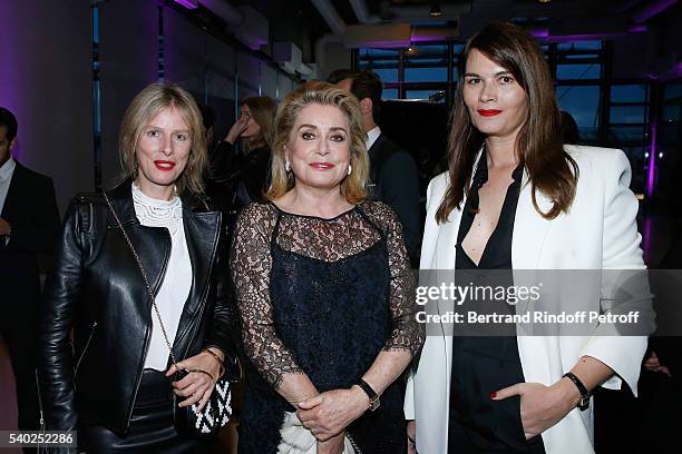 Actresses Karin Viard, Catherine Deneuve and Marina Hands attend YSL Beauty launches the new Fragrance "Mon Paris" at Cafe Le Georges on June 14,...
