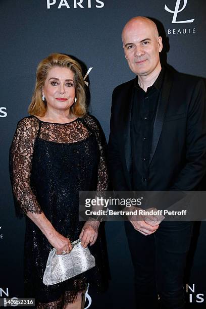 Actress Catherine Deneuve and General Director of of Yves Saint Laurent, Stephan Bezy attend YSL Beauty launches the new Fragrance "Mon Paris" at...