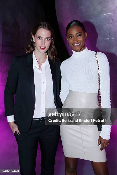 Egeria of YSL Beauty, model Crista Cober and model Melodie Monrose attend YSL Beauty launches the new Fragrance "Mon Paris" at Cafe Le Georges on...