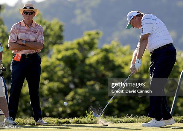 Ernie Els of South Africa under the watchful eye of coach David Leadbetter during a practice round prior to the 2016 U.S.Open at Oakmont Country Club...
