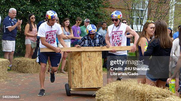 College students participate in the Red Bull chariot race during Spring Fair, an annual festival with music, food, shopping, and more that takes...