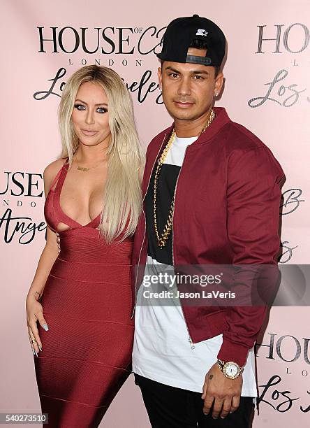 Aubrey O'Day and DJ Pauly D attend the House of CB flagship store launch at House Of CB on June 14, 2016 in West Hollywood, California.