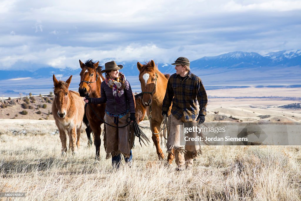 A woman with horses.