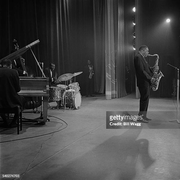 American jazz saxophonist John Coltrane performs with drummer Elvin Jones and saxophonist Eric Dolphy at Birmingham Hippodrome, 12th November 1961.