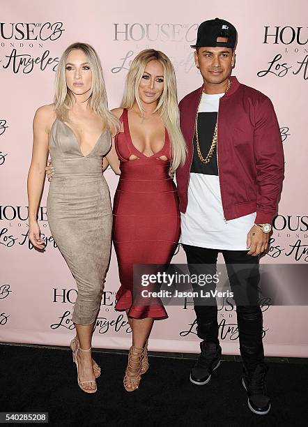 Aubrey O'Day and Shannon Bex of Dumblonde and DJ Pauly D attend the House of CB flagship store launch at House Of CB on June 14, 2016 in West...