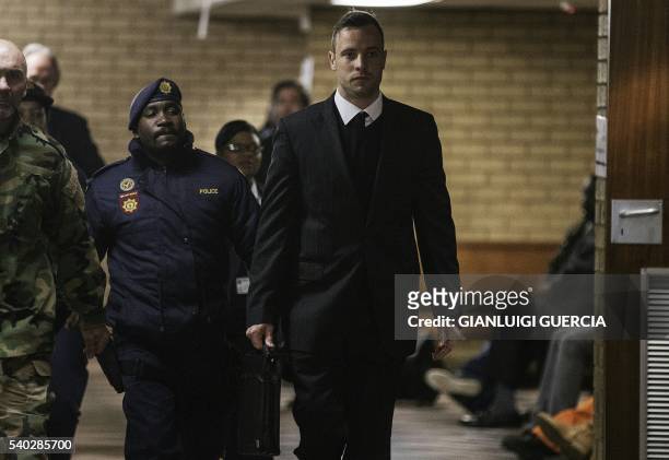 South African paralympian Oscar Pistorius arrives at the Pretoria High Court for sentencing procedures in his murder trial in Pretoria on June 15,...