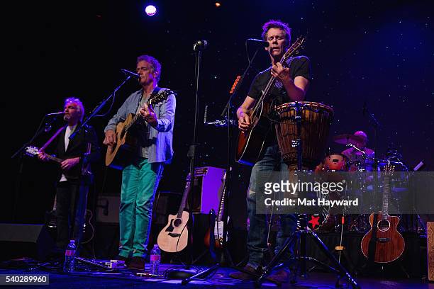 Michael Bacon and Kevin Bacon of The Bacon Brothers perform on stage at The Triple Door on June 14, 2016 in Seattle, Washington.