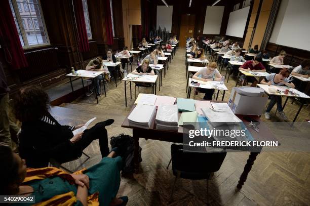 High school students take the philosophy exam, the first test session of the 2016 baccalaureate on June 15, 2016 at the Fustel de Coulanges high...