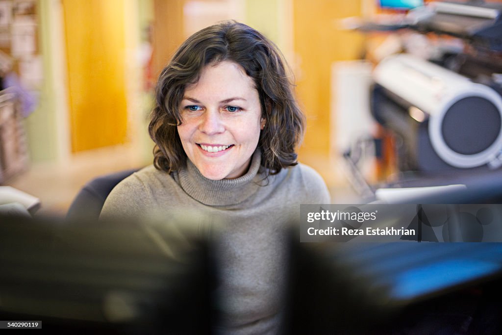 Woman in video chat session smiles