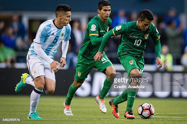 Matias Kranevitter of Argentina struggles for the ball against Jhasmany Campos of Bolivia during the 2016 Copa America Centenario Group D match...