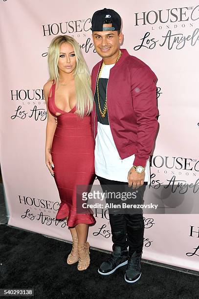 Singer Aubrey O'Day and DJ Pauly D attend the House of CB Flagship Store Launch party at the House of CB on June 14, 2016 in West Hollywood,...