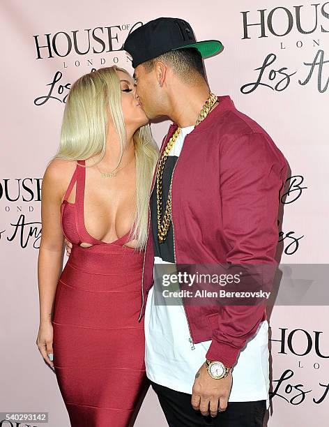 Singer Aubrey O'Day and DJ Pauly D attend the House of CB Flagship Store Launch party at the House of CB on June 14, 2016 in West Hollywood,...