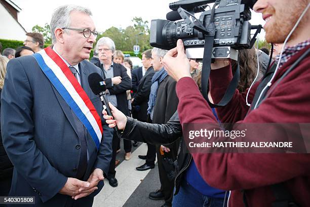 French Communist Party National Secretary Pierre Laurent speaks to the press on June 15 outside the house in Magnanville where a man claiming...