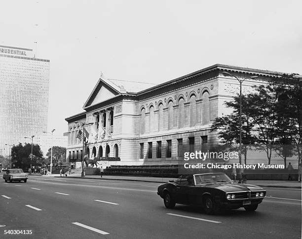 Exterior view of the Art Institute of Chicago, looking northeast from across Michigan Avenue, Chicago, Illinois, September 20, 1970. Automobiles are...